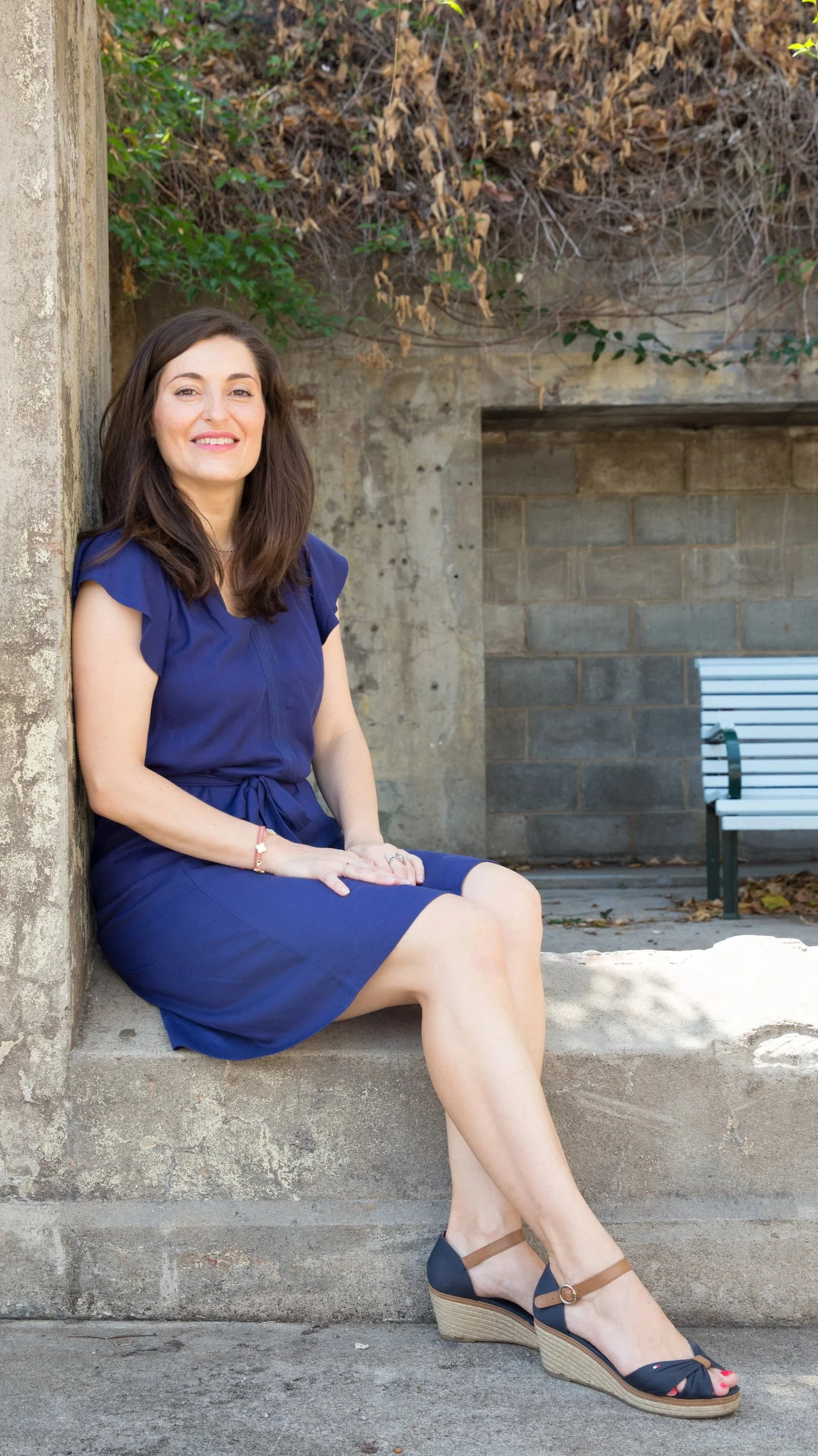 Nadine Piot, Clinical Psychologist, seated outdoors
